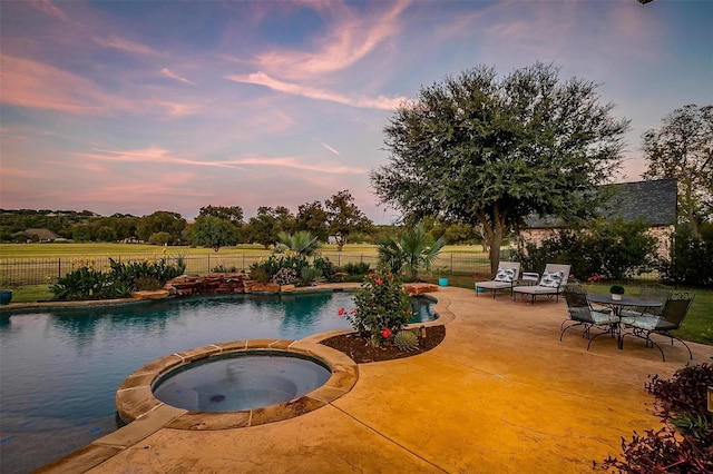 1204 E Scandinavian Ct, Granbury, TX 76048 - view of pool with a patio area and a pool with connected hot tub