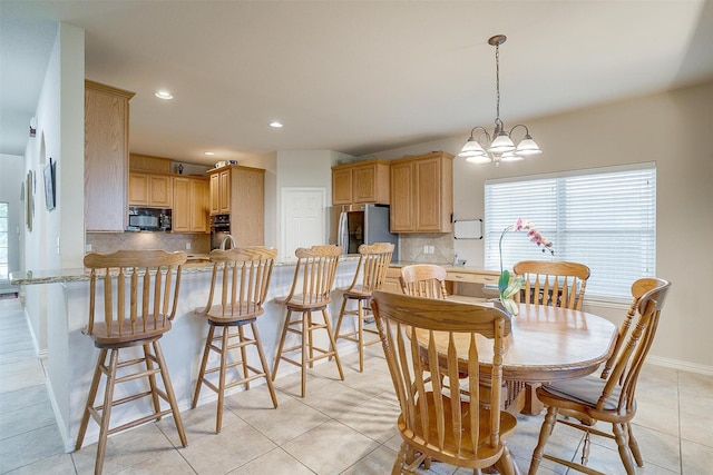2536 Glenn Ranch Dr, Burleson, TX 76028 - dining room with light tile patterned floors, a chandelier, and recessed lighting