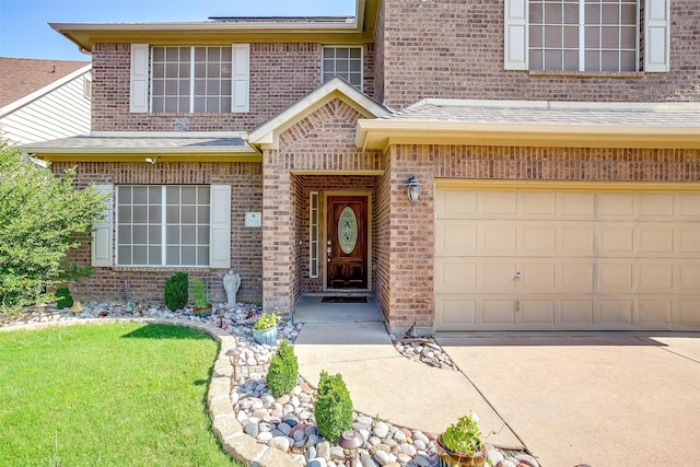 2536 Glenn Ranch Dr, Burleson, TX 76028 - doorway to property featuring brick siding, driveway, an attached garage, and roof with shingles