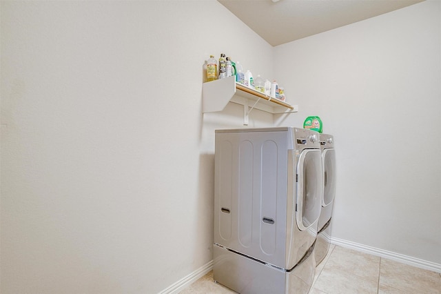 2536 Glenn Ranch Dr, Burleson, TX 76028 - washroom with washing machine and dryer and light tile patterned flooring