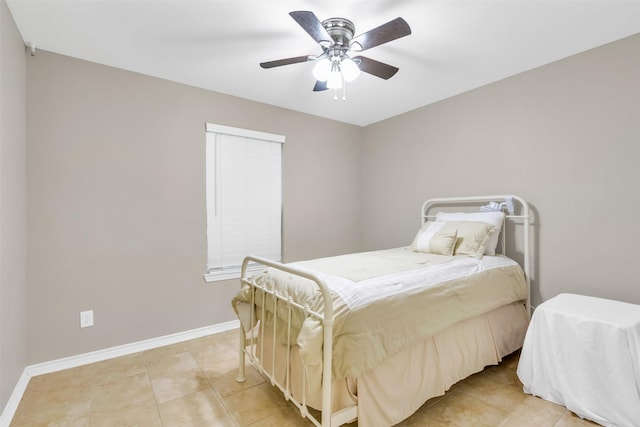 2017 Langston St, Fort Worth, TX 76105 - bedroom with light tile patterned floors and a ceiling fan