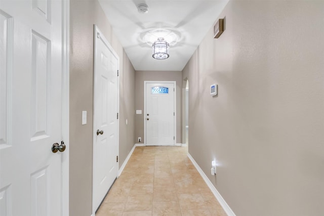 2017 Langston St, Fort Worth, TX 76105 - entryway featuring baseboards and light tile patterned flooring