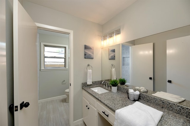 6817 Yolanda Dr, Fort Worth, TX 76112 - bathroom featuring toilet and vanity