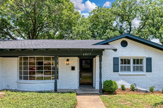 6817 Yolanda Dr, Fort Worth, TX 76112 - view of front of property with brick siding and roof with shingles