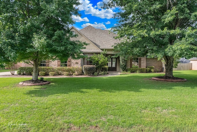 902 Blair Xing, Bossier City, LA 71111 - view of front of home featuring french doors, brick siding, and a shingled roof