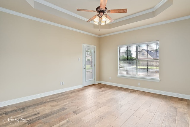 902 Blair Xing, Bossier City, LA 71111 - spare room featuring a raised ceiling, light wood-type flooring, ceiling fan, and crown molding