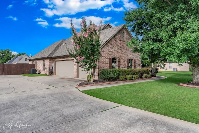 902 Blair Xing, Bossier City, LA 71111 - view of front of house featuring brick siding, driveway, an attached garage, and a shingled roof
