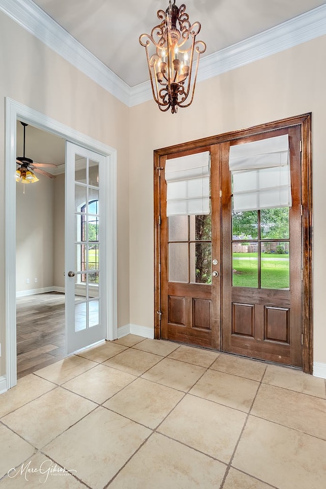 902 Blair Xing, Bossier City, LA 71111 - entryway with french doors, ornamental molding, a chandelier, and light tile patterned floors