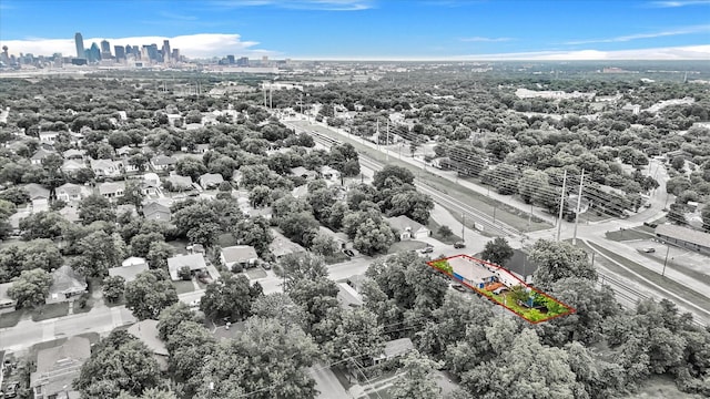 1342 E Waco Ave, Dallas, TX 75216 - aerial view of property and surrounding area featuring property boundaries highlighted and skyline