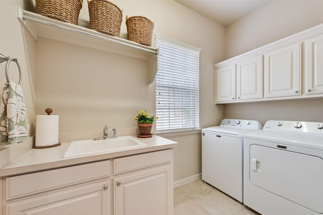 4263 Veneto Dr, Frisco, TX 75033 - washroom featuring washing machine and dryer, cabinet space, and light tile patterned floors