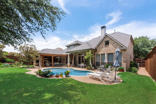 4263 Veneto Dr, Frisco, TX 75033 - back of house with a patio, a fenced backyard, brick siding, and roof with shingles