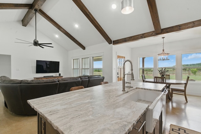 170 La Cresta Ln, Mineral Wells, TX 76067 - kitchen featuring beamed ceiling, recessed lighting, light stone countertops, high vaulted ceiling, and hanging light fixtures