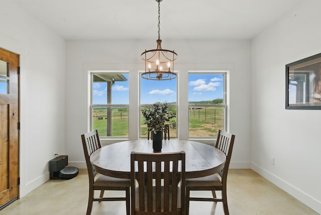 170 La Cresta Ln, Mineral Wells, TX 76067 - dining room with a chandelier and baseboards