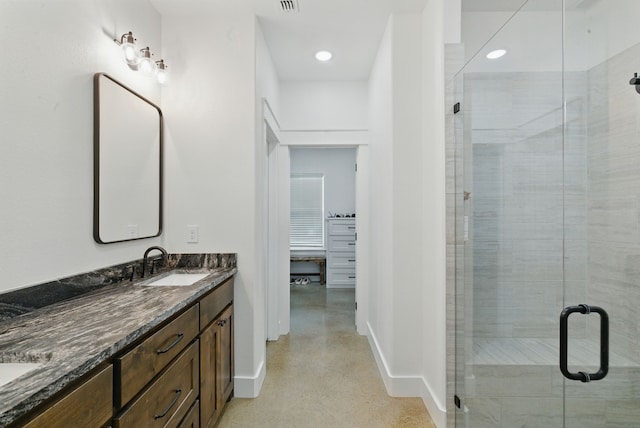 170 La Cresta Ln, Mineral Wells, TX 76067 - full bath with double vanity, a shower stall, and recessed lighting