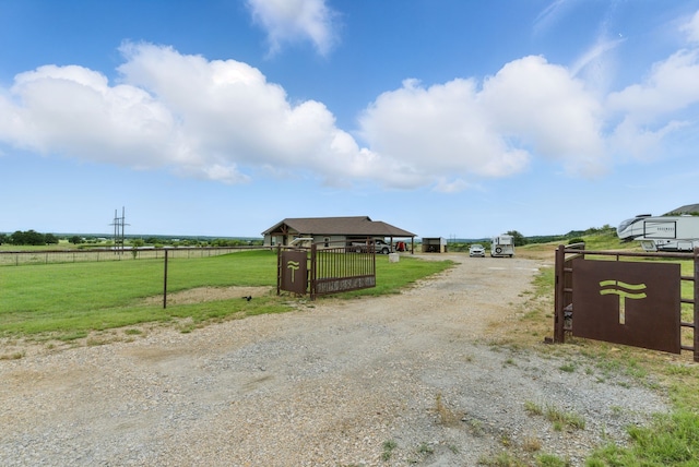 170 La Cresta Ln, Mineral Wells, TX 76067 - view of dirt / gravel driveway featuring a gated entry and a view of countryside