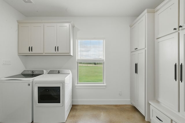 170 La Cresta Ln, Mineral Wells, TX 76067 - laundry area with washing machine and clothes dryer and cabinet space