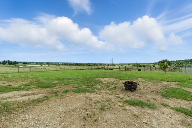 170 La Cresta Ln, Mineral Wells, TX 76067 - view of yard with a rural view and an outdoor fire pit