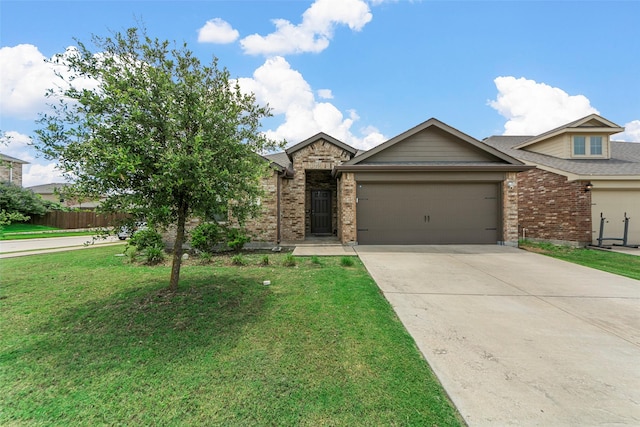 901 Opal Path, Princeton, TX 75407 - view of front of house featuring brick siding, a garage, and driveway