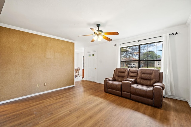 803 Melody Cir, Kaufman, TX 75142 - living room featuring wood finished floors, a ceiling fan, and ornamental molding