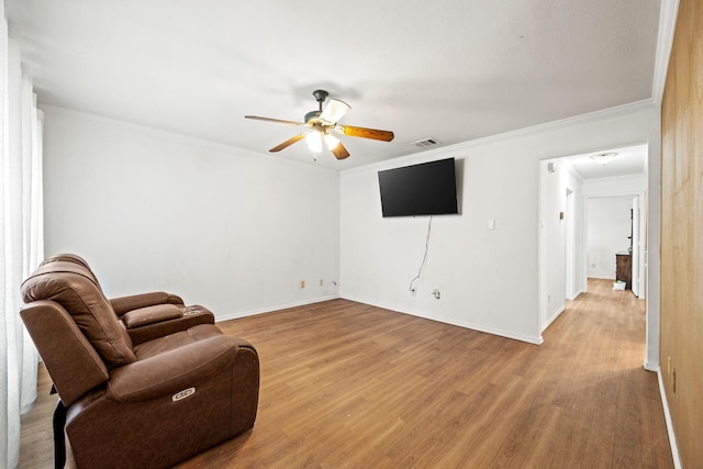 803 Melody Cir, Kaufman, TX 75142 - unfurnished room with a ceiling fan, crown molding, and light wood finished floors