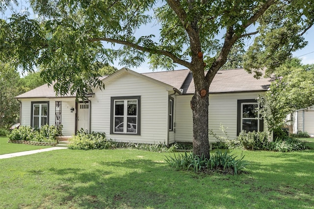 103 E 14th St, Joshua, TX 76058 - ranch-style house with a front lawn