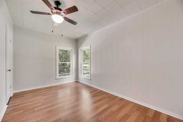 103 E 14th St, Joshua, TX 76058 - spare room with light wood-style floors and a ceiling fan