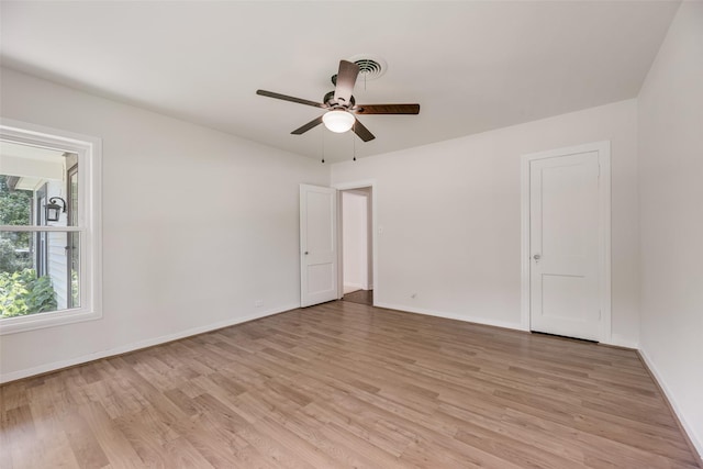 103 E 14th St, Joshua, TX 76058 - unfurnished room featuring light wood-style flooring and a ceiling fan