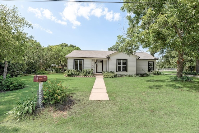 103 E 14th St, Joshua, TX 76058 - ranch-style home with a front yard