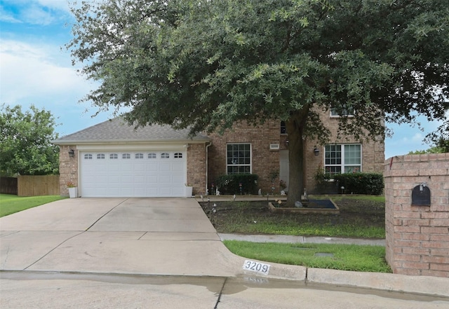 3209 Silver Point Ct, Mansfield, TX 76063 - view of front facade featuring concrete driveway, brick siding, and an attached garage