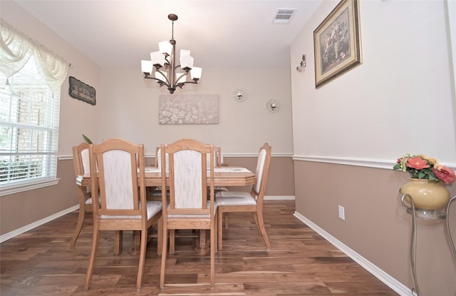3209 Silver Point Ct, Mansfield, TX 76063 - dining space featuring a chandelier and wood finished floors