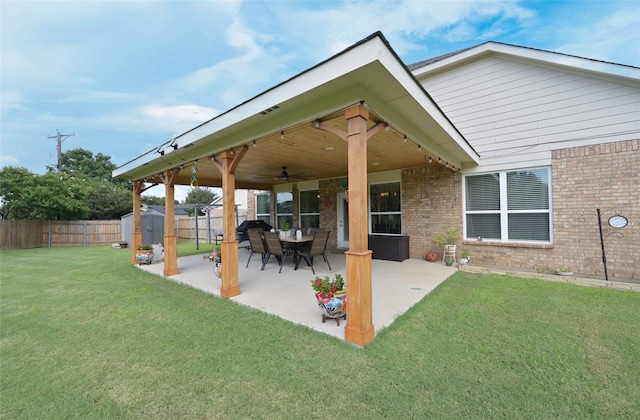 3209 Silver Point Ct, Mansfield, TX 76063 - fenced backyard featuring a storage shed, ceiling fan, and a patio area