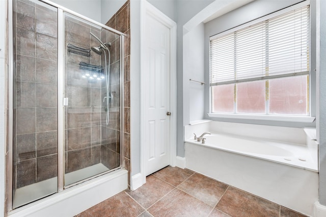 11722 Estacado Dr, Frisco, TX 75033 - bathroom with a bath, a stall shower, and tile patterned floors
