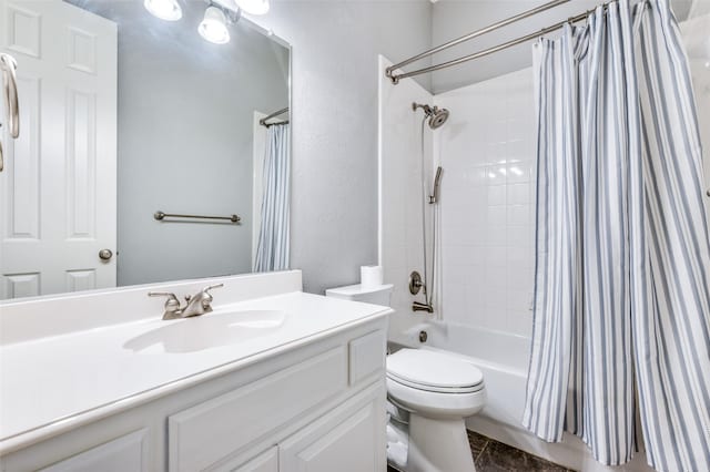 11722 Estacado Dr, Frisco, TX 75033 - full bathroom featuring vanity, shower / bath combo with shower curtain, and a textured wall