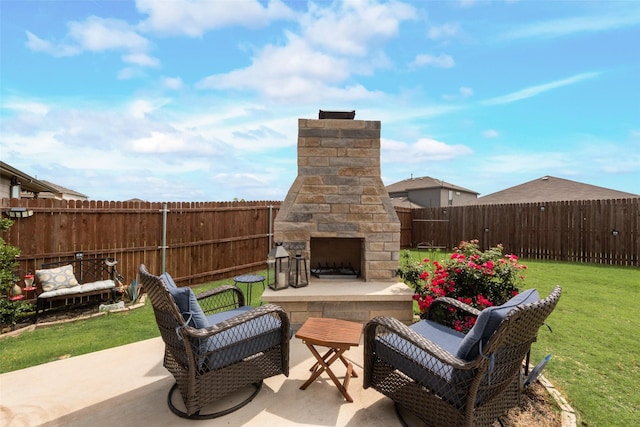 15809 Culford Ln, Fort Worth, TX 76247 - fenced backyard with exterior fireplace and a patio area