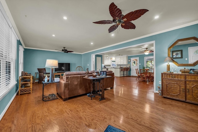 2113 Trinity Dr, Waco, TX 76710 - living area with ceiling fan, wood finished floors, ornamental molding, and recessed lighting