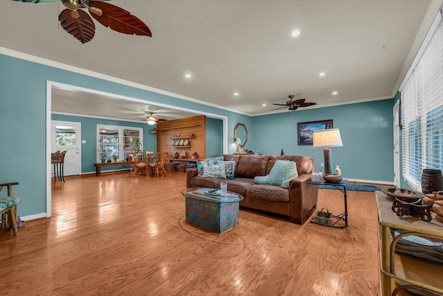 2113 Trinity Dr, Waco, TX 76710 - living room with ceiling fan, ornamental molding, recessed lighting, and wood finished floors