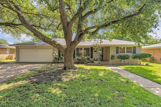 2113 Trinity Dr, Waco, TX 76710 - single story home featuring an attached garage, driveway, and a front yard