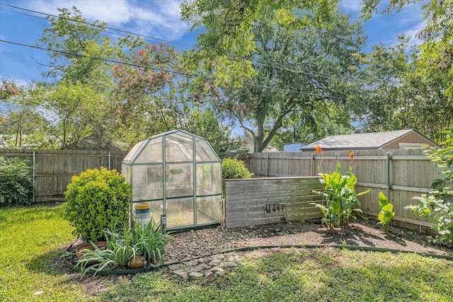 2113 Trinity Dr, Waco, TX 76710 - view of greenhouse featuring a fenced backyard