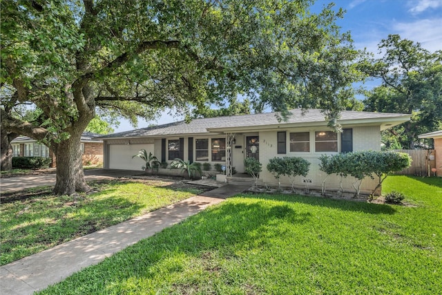 2113 Trinity Dr, Waco, TX 76710 - ranch-style house with an attached garage, driveway, and brick siding