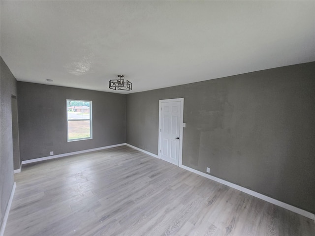 130 Jackson St N, Sulphur Springs, TX 75482 - unfurnished room with light wood-type flooring and baseboards