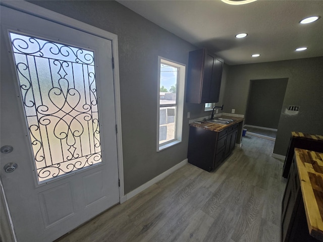 130 Jackson St N, Sulphur Springs, TX 75482 - kitchen featuring light wood-style floors and recessed lighting