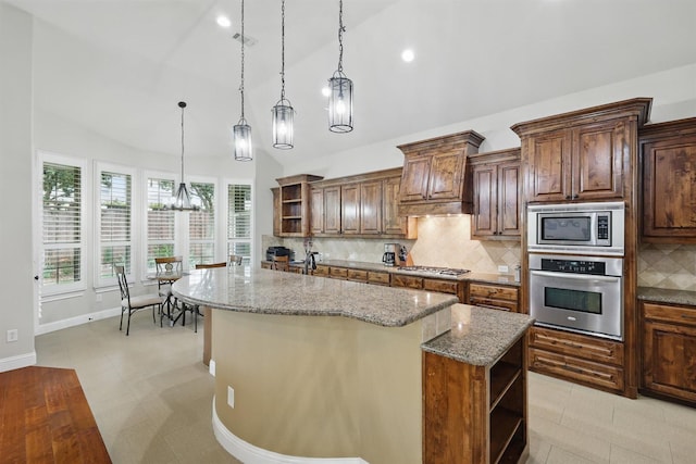 2428 Lilyfield Dr, Trophy Club, TX 76262 - kitchen featuring open shelves, stainless steel appliances, vaulted ceiling, backsplash, and decorative light fixtures