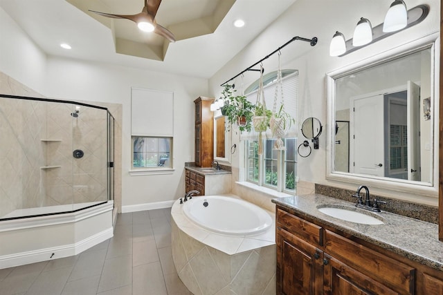 2428 Lilyfield Dr, Trophy Club, TX 76262 - full bath with a stall shower, a garden tub, two vanities, tile patterned floors, and healthy amount of natural light