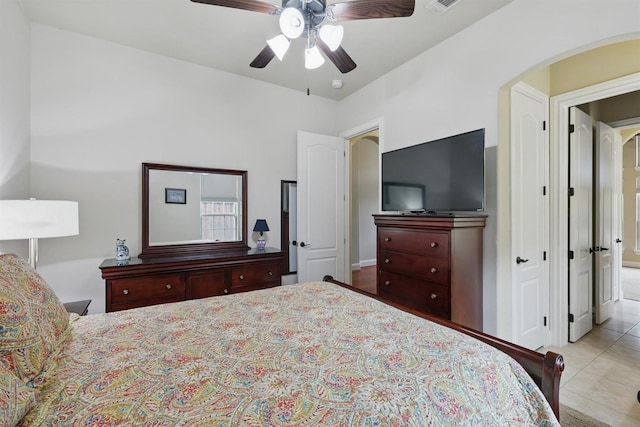 2428 Lilyfield Dr, Trophy Club, TX 76262 - tiled bedroom featuring ceiling fan and arched walkways