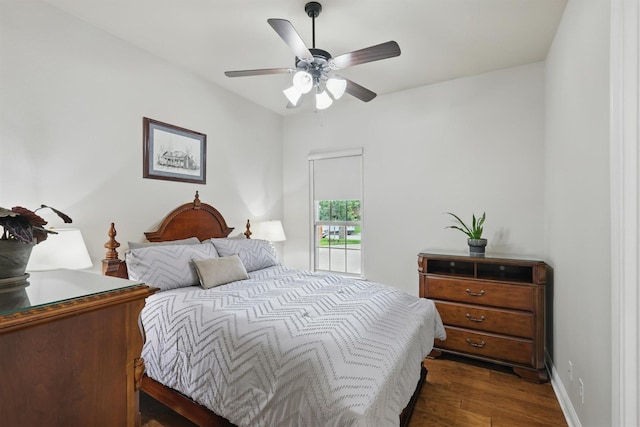 2428 Lilyfield Dr, Trophy Club, TX 76262 - bedroom featuring dark wood finished floors and a ceiling fan