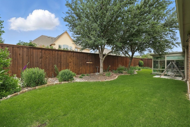 2428 Lilyfield Dr, Trophy Club, TX 76262 - fenced backyard featuring a sunroom