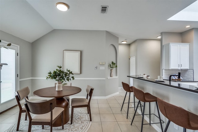 10715 Robincreek Ln, Frisco, TX 75035 - dining area with healthy amount of natural light, light tile patterned floors, and recessed lighting