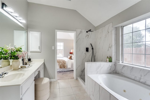 10715 Robincreek Ln, Frisco, TX 75035 - bathroom featuring double vanity, a whirlpool tub, a marble finish shower, connected bathroom, and tile patterned flooring