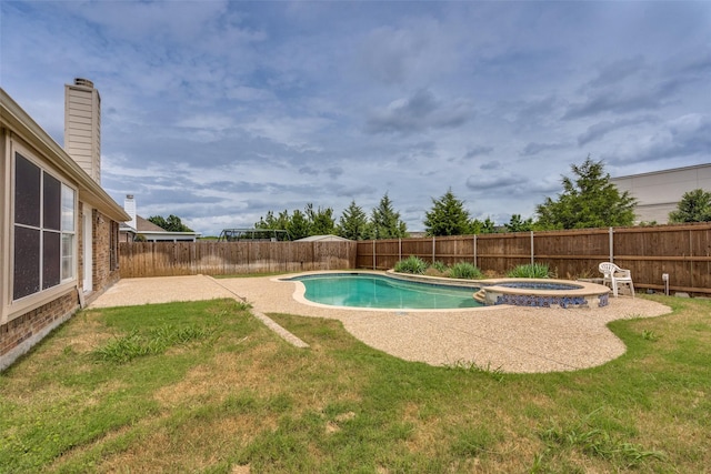 10715 Robincreek Ln, Frisco, TX 75035 - view of swimming pool with a fenced backyard, a patio area, and a pool with connected hot tub