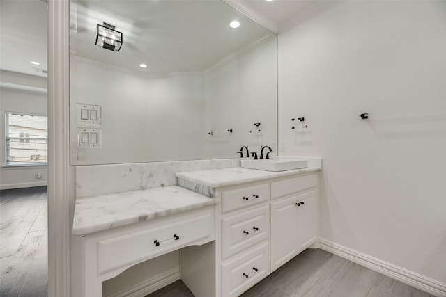 5513 Martel Ave, Dallas, TX 75206 - bathroom with crown molding, vanity, recessed lighting, and wood finished floors